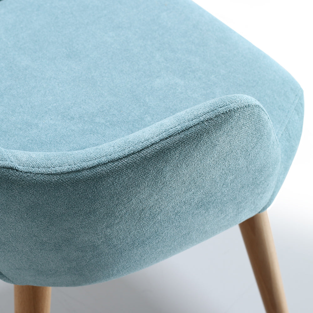 Close-up of a light blue Andre chair with wooden legs on a white background