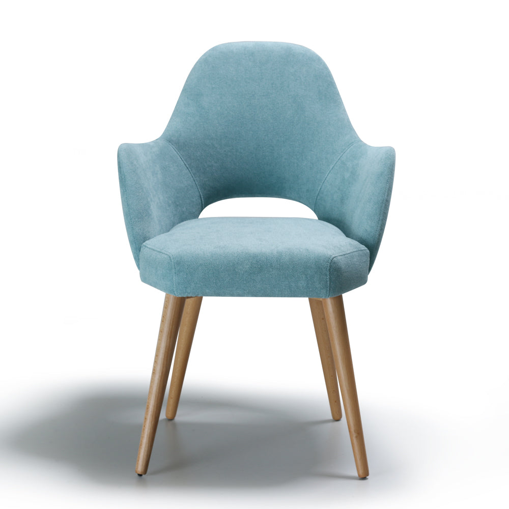 Front view of blue Andre chair with wooden legs on a white background