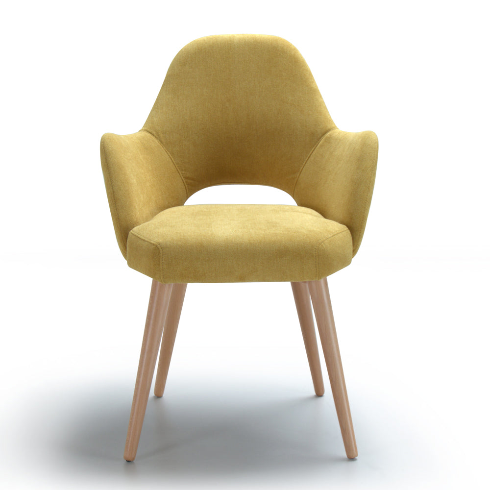 Yellow Andre armchair with wooden legs on a white background