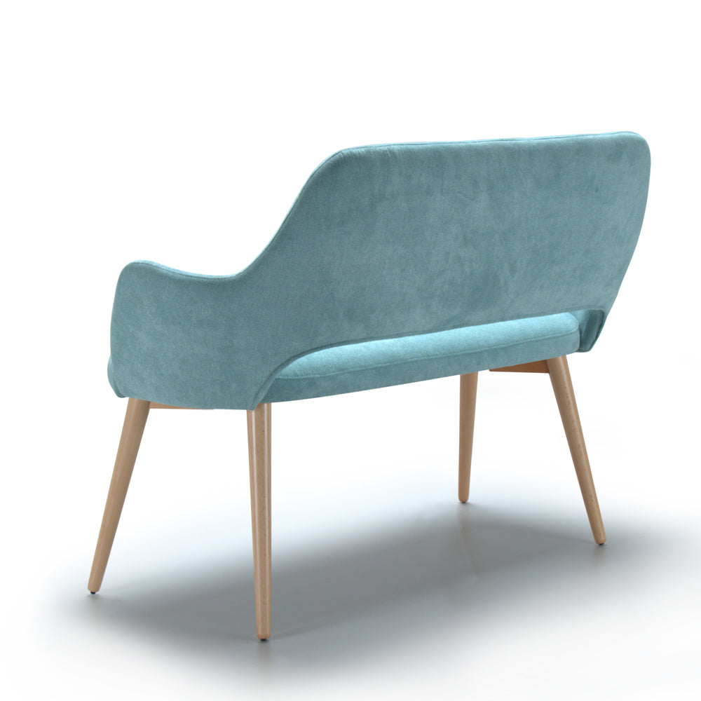 Back view of blue Andre sofa with wooden legs on a white background