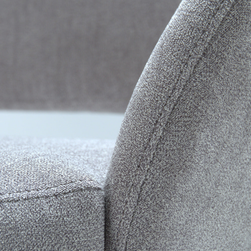 Close-up of a textured gray fabric surface on Andre sofa