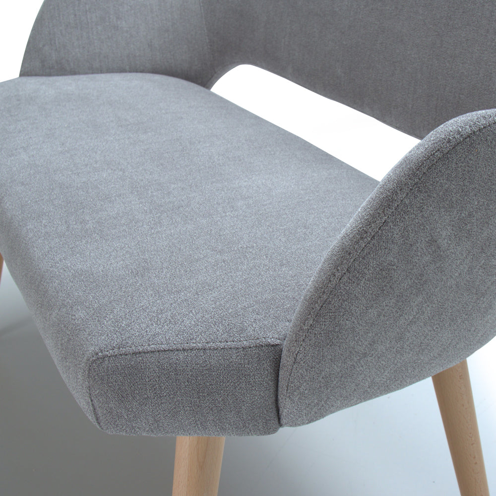 Gray Andre upholstered sofa with wooden legs on a white background