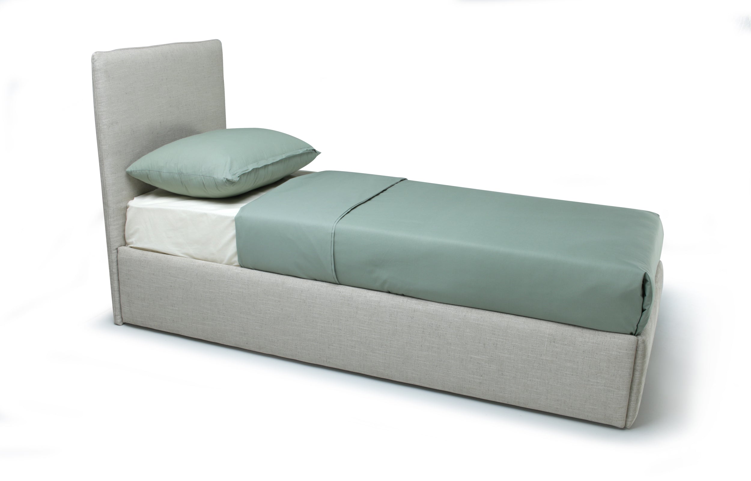 An upholstered single bed frame in light gray fabric, shown with a sage green fitted sheet, matching pillow, and a white mattress topper on a plain white background.