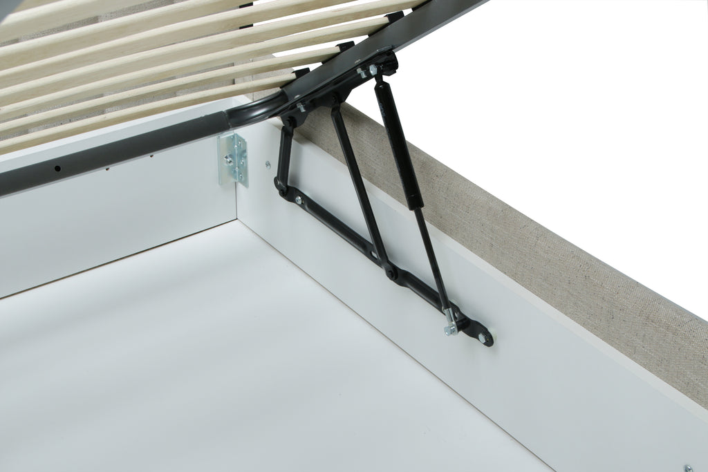 Bed frame with a spring support system on a white background
