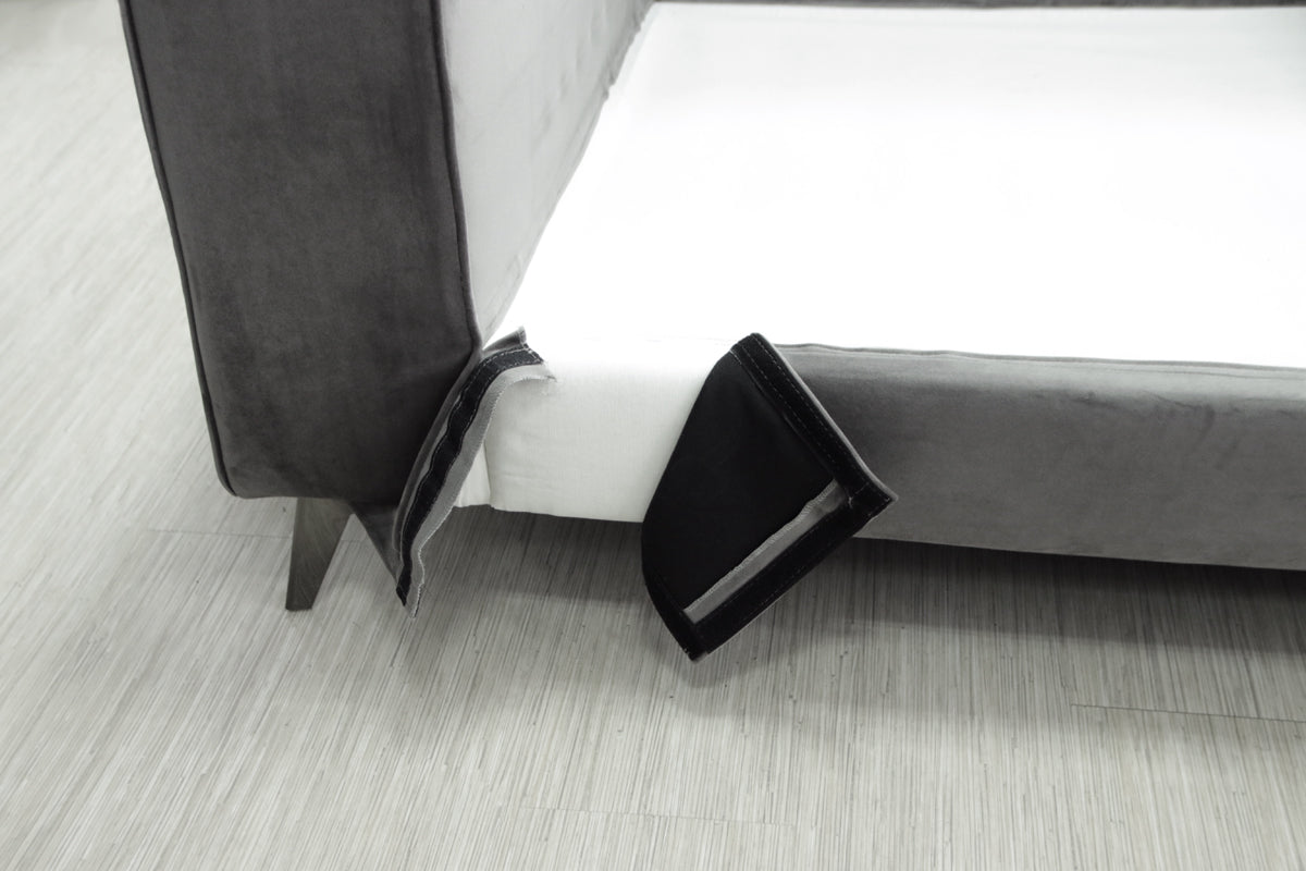 Detail view of removable upholstery of the  sofa Connor - grey color.