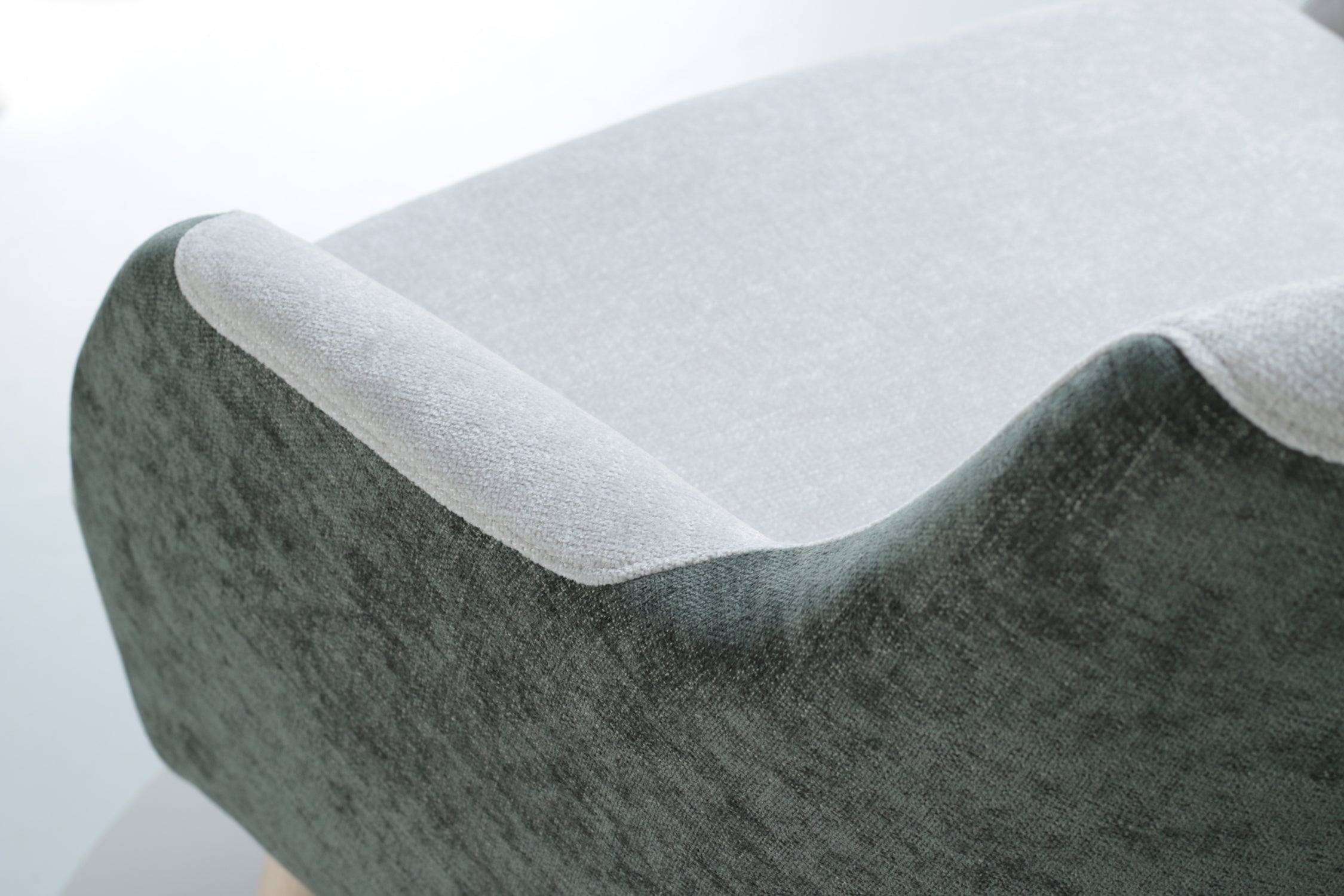 Modern armchair Lola with dark green and white design on a white background -close back side view