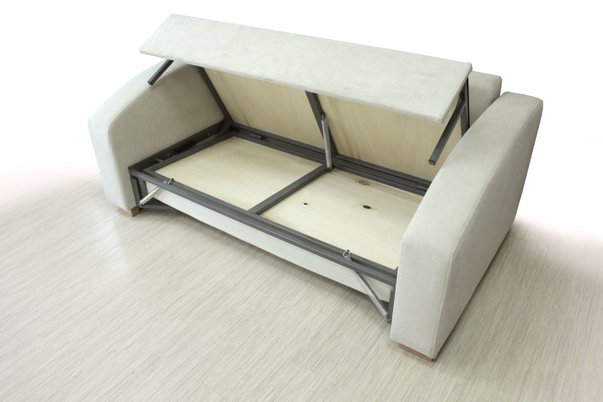 MAX white sofa bed, part open on a light wooden floor.