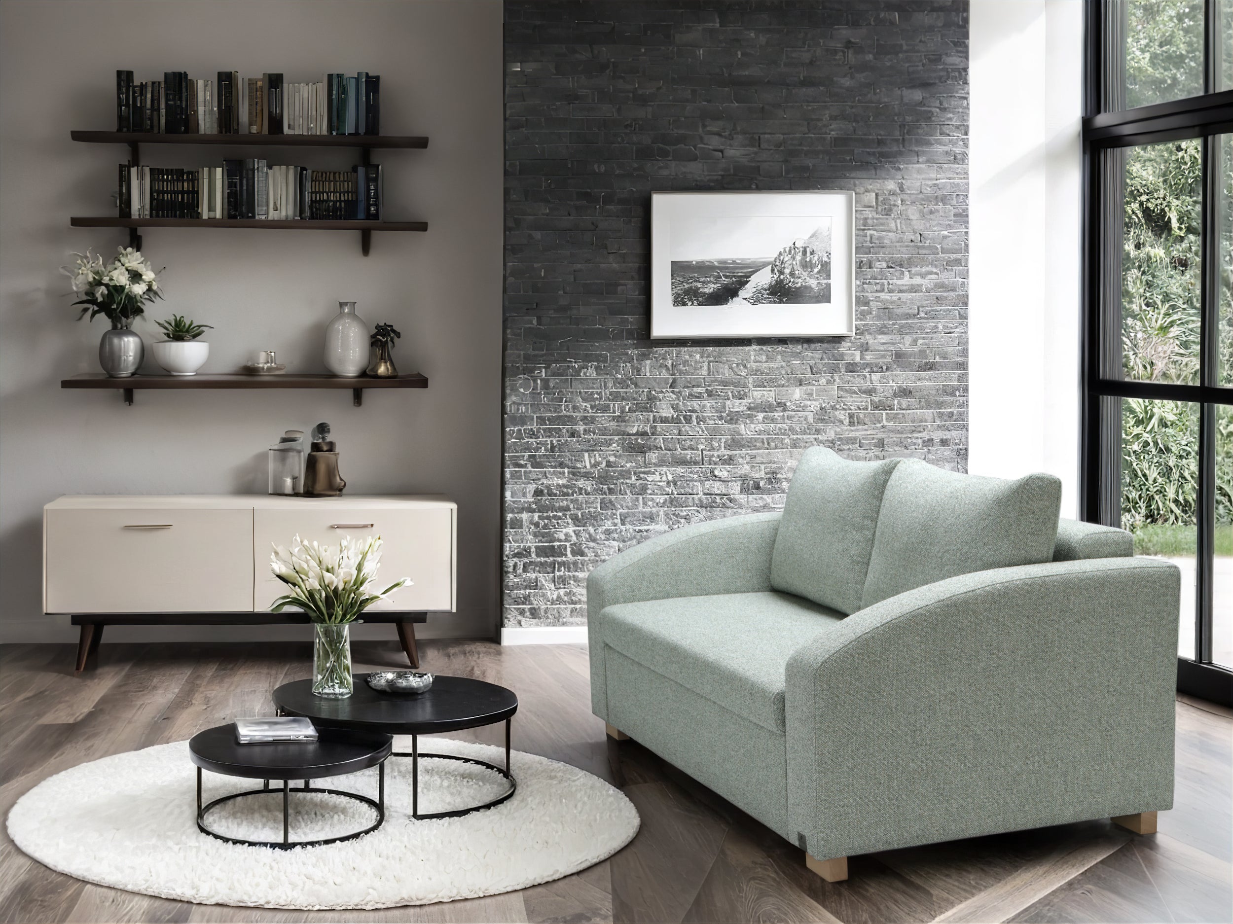 Modern living room with a light green MAX  sofa, coffee table, and decorative items.