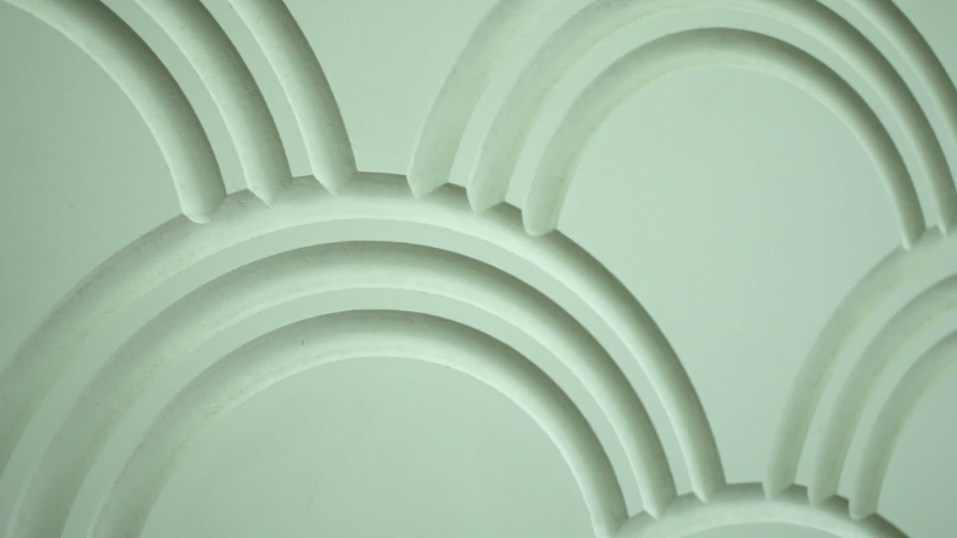 Close video of decorative wall panel with embossed art deko pattern