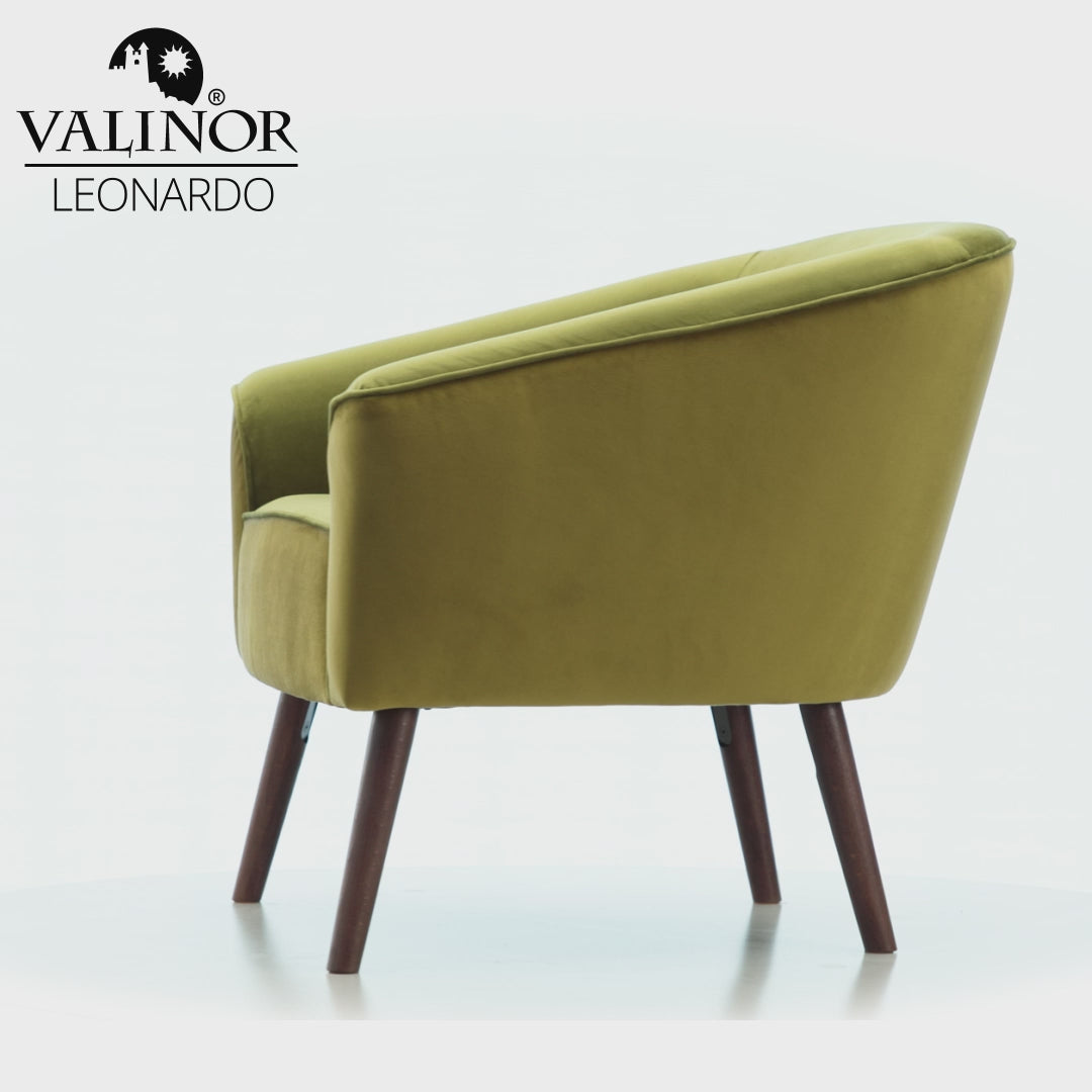 Video of green armchair Leonardo with wooden legs on a white background.
