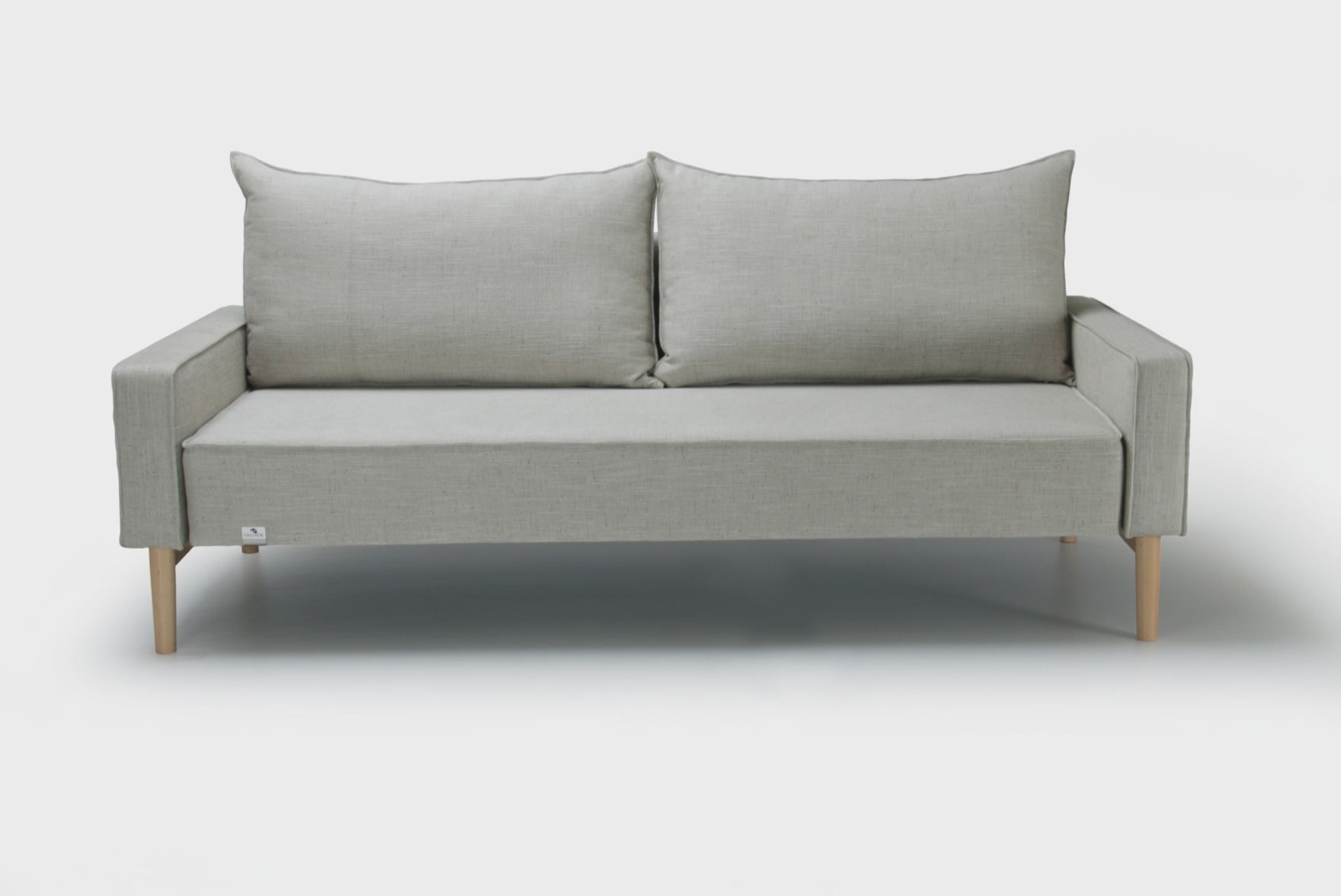 Alpine sofa bed with upholstered armrest on white background